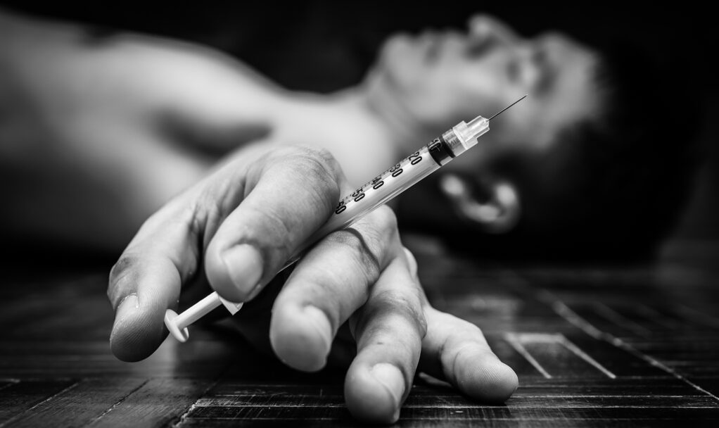Syringe,In,Overdose,Asian,Male,Drug,Addict,Hand,,Bw,Photo