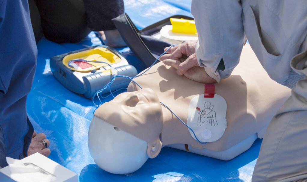 11training,Using,And,An,Aed,And,Bag,Mask,Valve,On